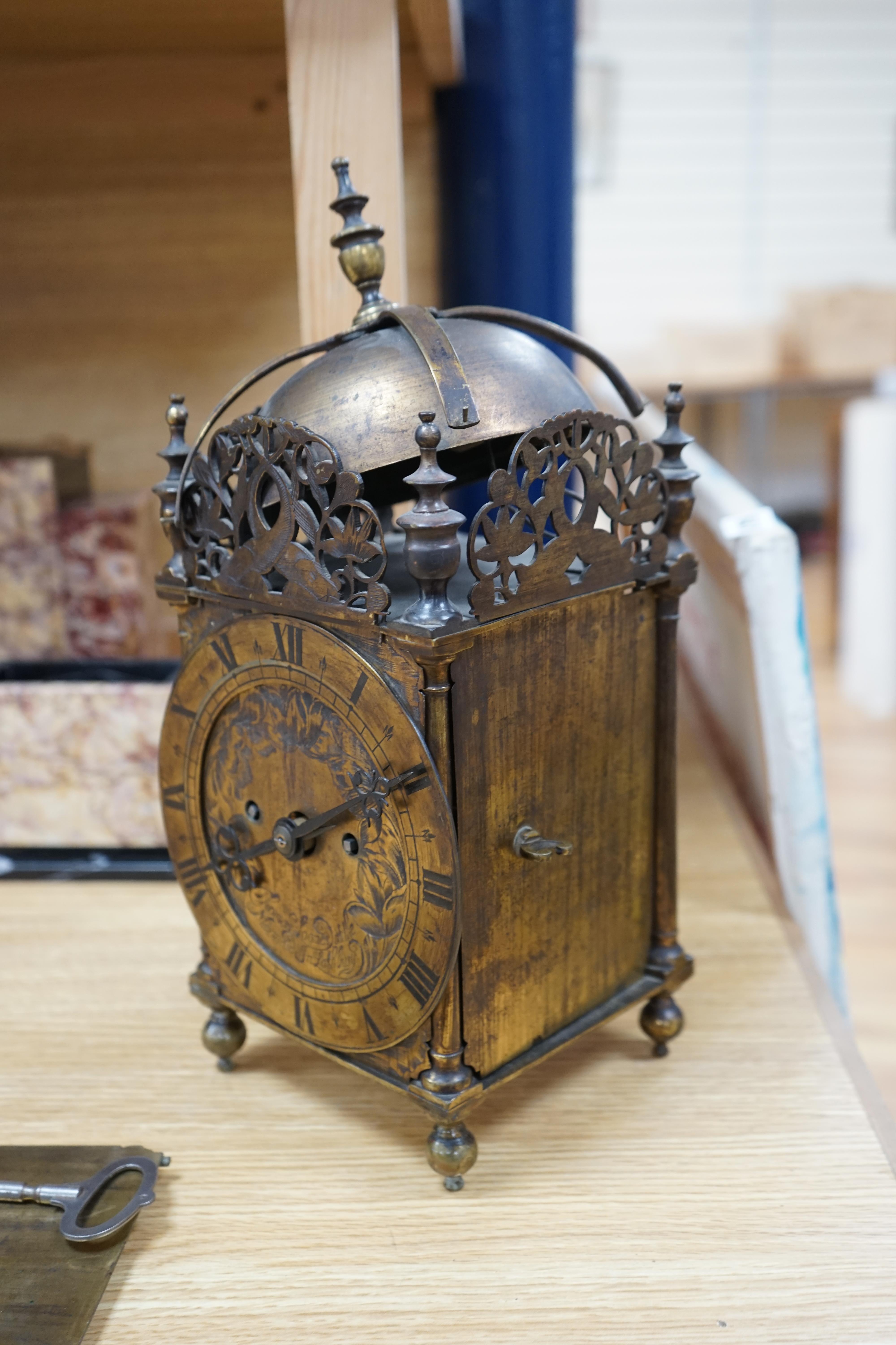 A Victorian lantern clock, Thomas Loomes at the Mermaid in Lothbury to the dial plate, twin fusee movement, 35cm high. Condition - fair, parts detached